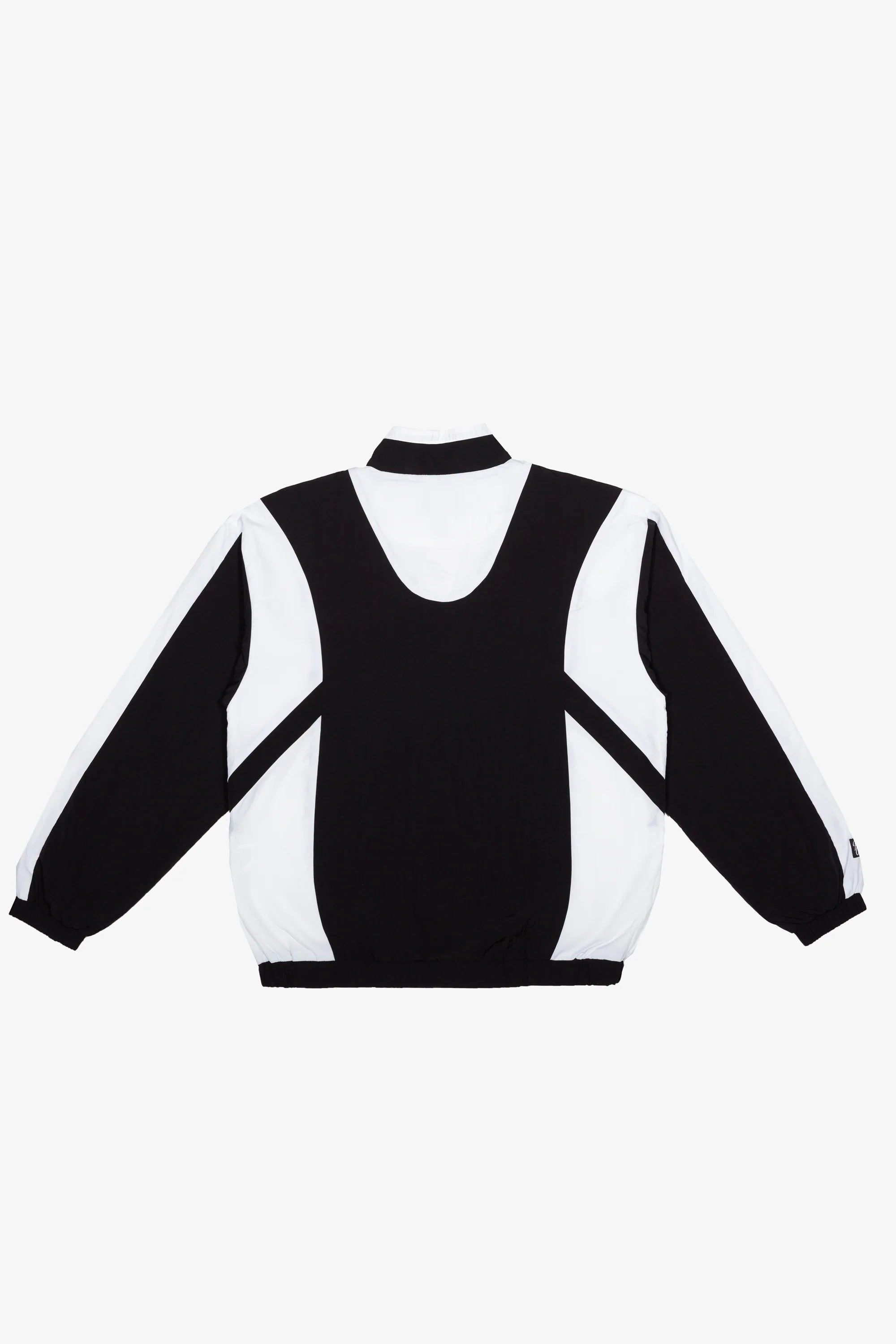 Black and white long-sleeve top on a white background