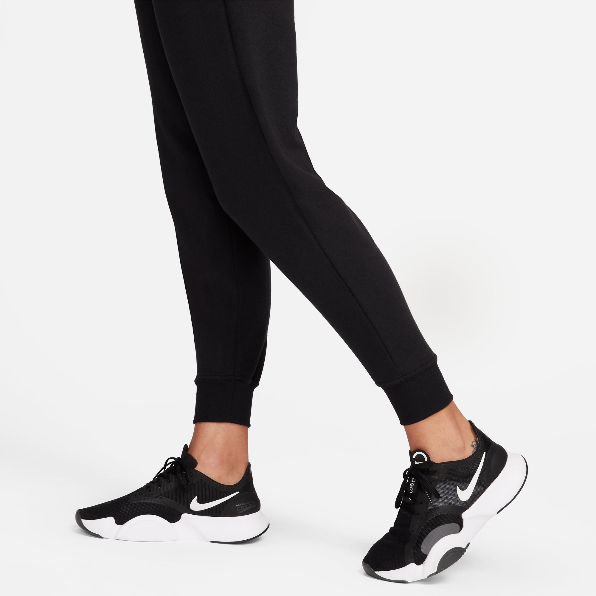 Joggers de rizo francés 7/8 de talle alto Nike Dri-FIT para mujer