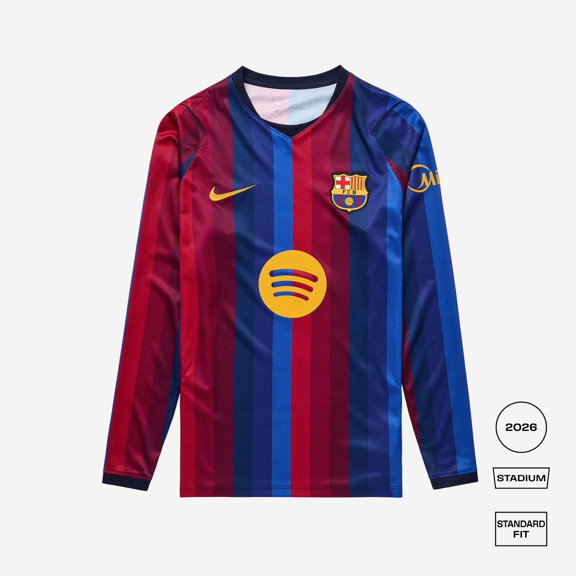 A long-sleeve FC Barcelona soccer jersey with red and blue vertical stripes, featuring the yellow Nike swoosh, FC Barcelona crest, and yellow Spotify sponsor logo on the front, displayed on a light gray background with fit and season labels.