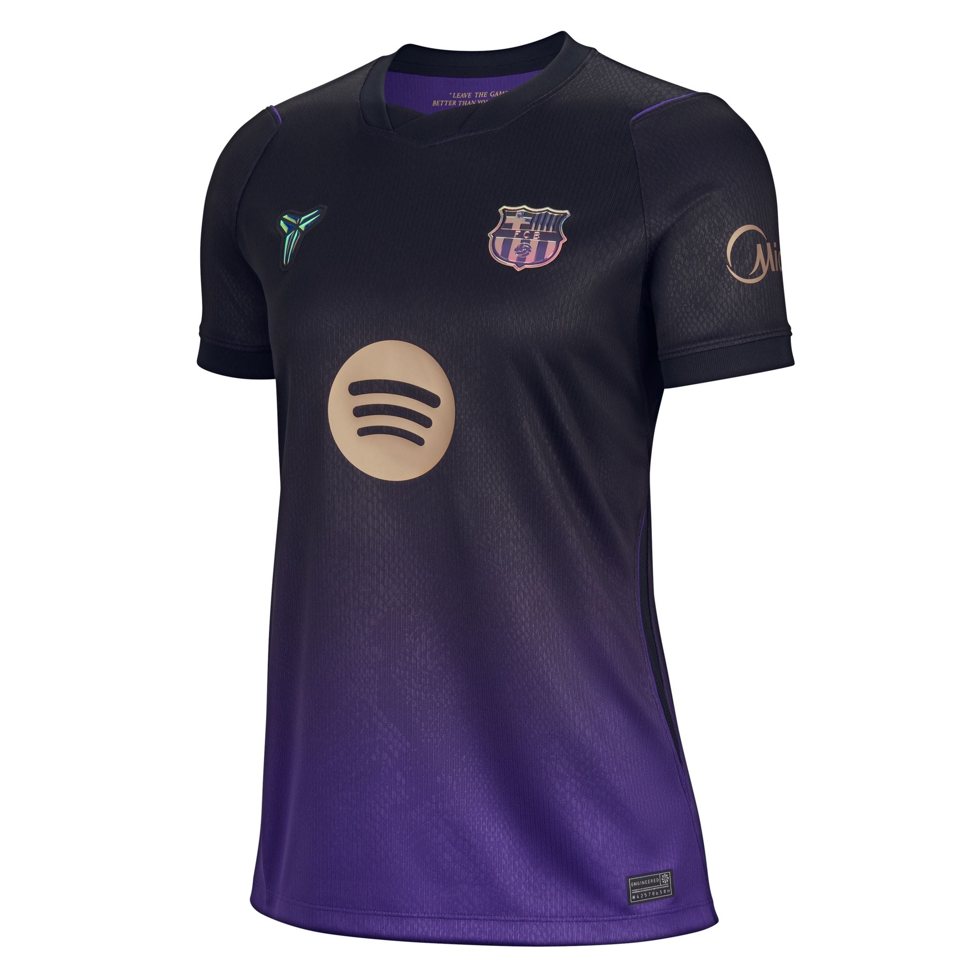 A short-sleeve FC Barcelona soccer jersey with a dark purple-to-black gradient, featuring a beige Spotify sponsor logo on the front, the FC Barcelona crest on the chest, and a green Puma logo on the right chest.