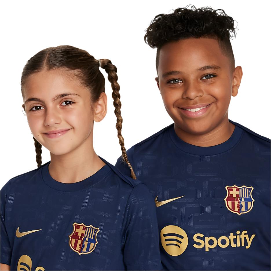 F.C. Barcelona Academy Pro Home Older Kids' Nike Dri-FIT Football Pre-Match Short-Sleeve Top